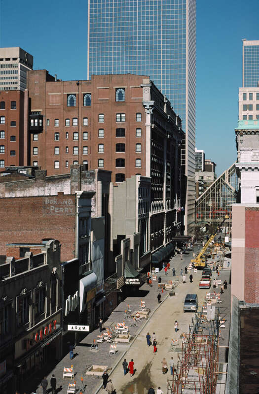 Looking N from parking garage at 4th and Chestnut Sts..
Businesses on west side of 4th St. include <a href="http://en.wikipedia.org/wiki/McCrory_Stores" rel="nofollow">McCrory</a> five and dime, House of Adam men's clothing and <a