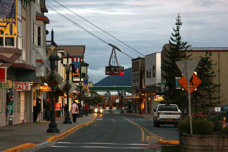 A Tourist's-eye view, heading for the cruise-ship docks.  The Mount-Roberts Tramway car is centered over the street.