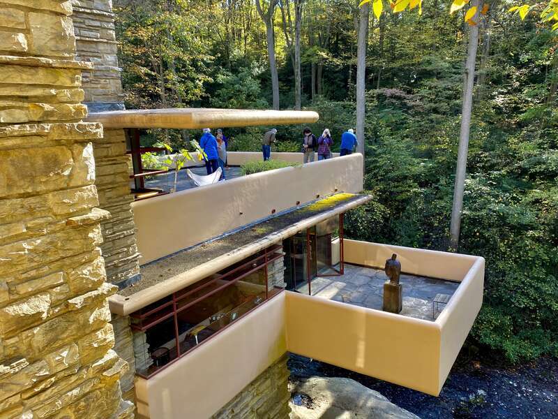 Looking over several layers of cantilevered terraces at Fallingwater, the celebrated house designed by Frank Lloyd Wright for Pittsburgh department store magnate Edgar Kaufmann, on an October 2021 morning.