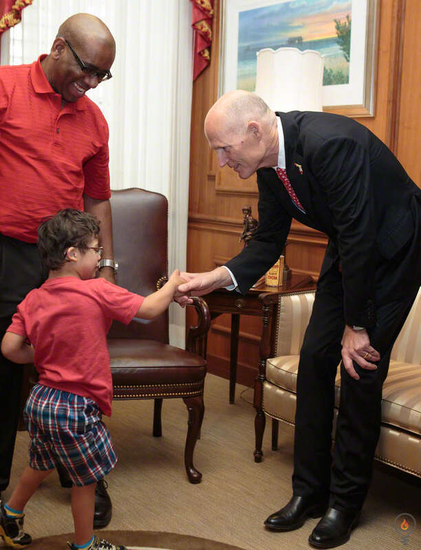 Florida Governor Rick Scott welcomes Down Syndrome Awareness Week 2016 with fist-bumps and hand-shakes