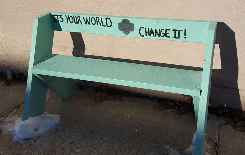 Through the town of Lanesboro, Minnesota, colorful benches line the streets. All include a pithy saying.