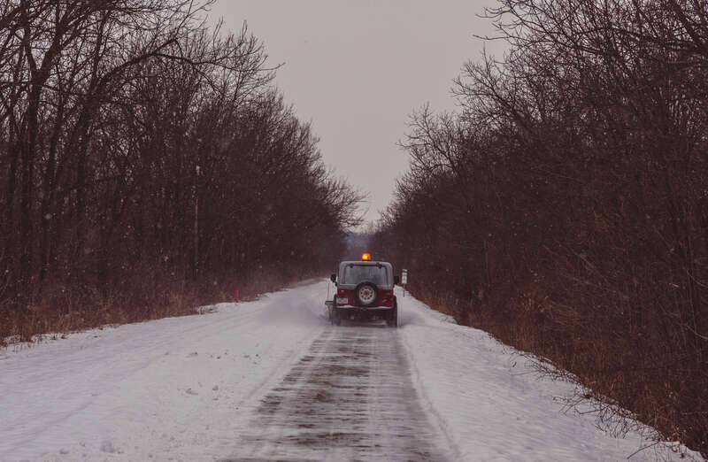 Plowing snow from the High Trestle Trail in Madrid in Central Iowa, United States.