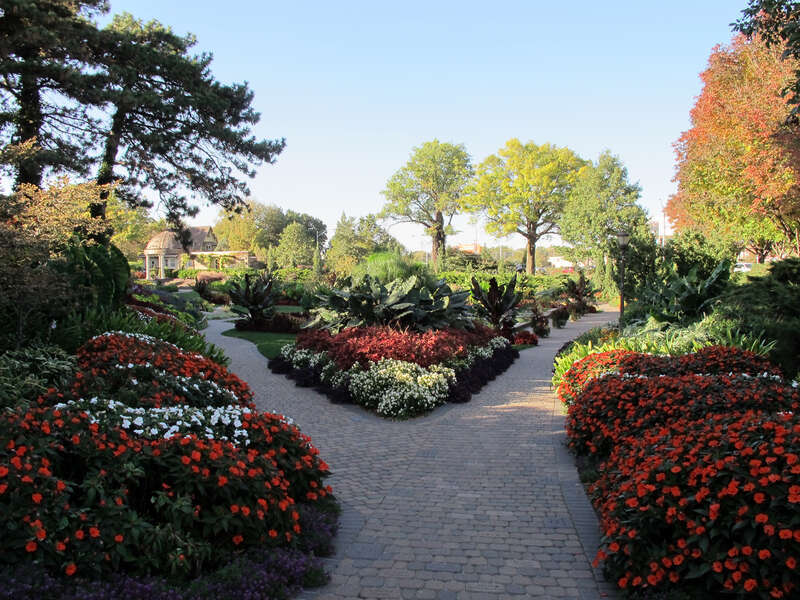 Photo of the Sunken Gardens.  Photo taken off of S. 27th &amp; "C" Streets; from near the southeast entrance of the garden, in Lincoln, Nebraska.  Photo looking north-northwest.  The Rotary Pavilion can be seen near center-left and the southeast pool
