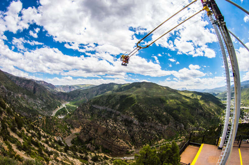 
500px provided description: The Big Swing [#park ,#sky ,#landscape ,#fun ,#mountain ,#big ,#amusement park ,#joy ,#great ,#swing]