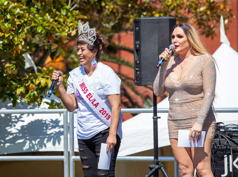 Emcee Alexandra de la Vega speaks alongside Miss El/La 2019, Norma Griyett, at the 2019 San Francisco Trans March.