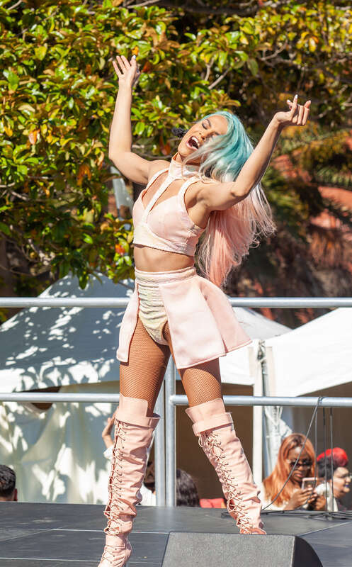 Mikaela Marvel, a dancer with the Ladies of AsiaSF, performs on stage at the 2019 San Francisco Trans March.