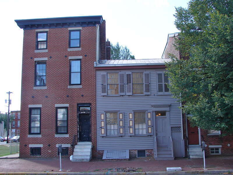 "Walt Whitman Neighborhood" as listed by the NRHP since January 20, 1978. At 326-332 Mickle St. (generally known as Martin Luther King Drive) in Camden, New Jersey.  This name is something of an artifact of the NRHP.  The wooden house in the middle