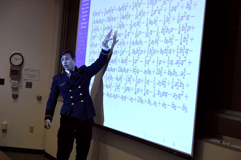 Midshipman 1st Class Ian Shaw talks about his research on the construction of rational maps on the projective line with given dynamical structure, during a 2016 Trident Scholar presentation held at the United States Naval Academy. With special