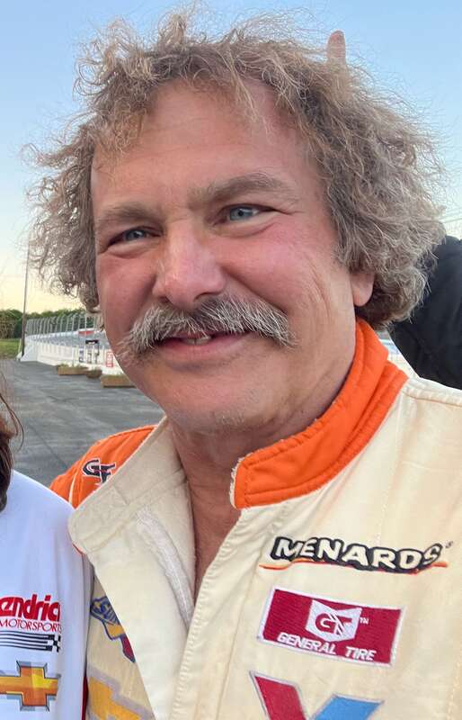 While getting autographs I took a photo with each driver present.