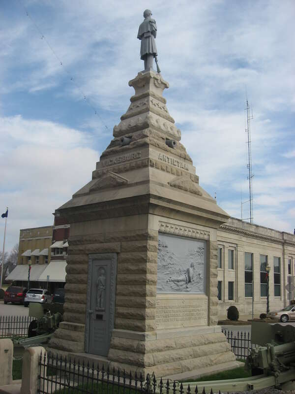 Southern and western sides of the Soldiers' and Sailors' Memorial at the Dubois County Courthouse, located on Courthouse Square in downtown Jasper, Indiana, United States.  Built in 1894, the monument and the courthouse are listed together on the