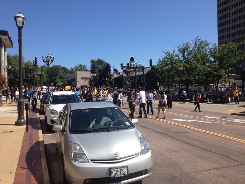 Marching in the street.