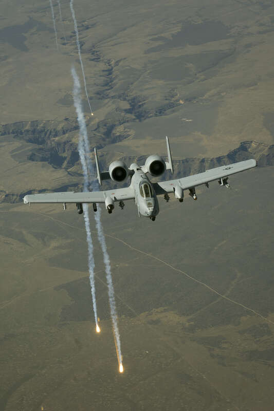 An Idaho Air National Guard A-10, Thunderbolt II, from the 190th Fighter Squadron, Boise, Idaho fires off flares on departure from receiving fuel from a 151st Air Refueling Wing KC-135 during a training mission May 10 over southern Idaho. The 151st