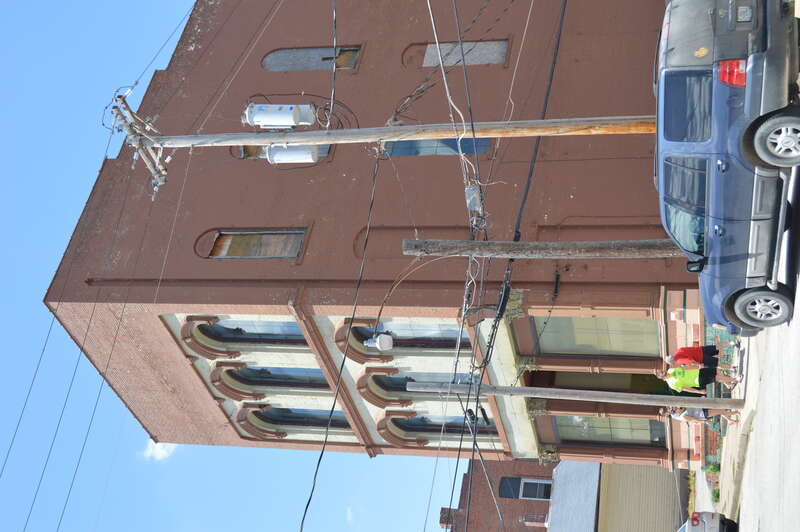 Front and eastern side of the Hock Building, located at 312 Center Street in Hannibal, Missouri, United States.  Built in 1872, it is listed on the National Register of Historic Places.