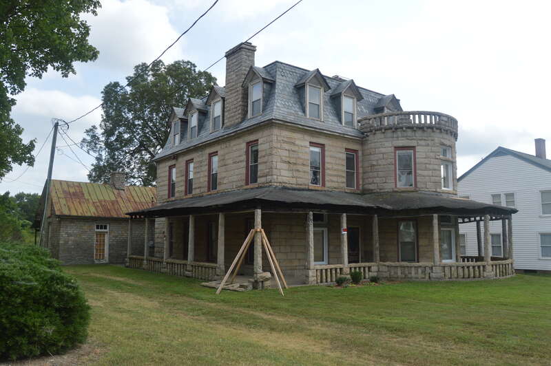 Front and northeastern side of the Napoleon Bonaparte McCanless House, located at 619 S. Main Street (U.S. Route 29/U.S. Route 70/North Carolina Highway 150) in Salisbury, North Carolina, United States.  Built in 1897, it is listed on the National