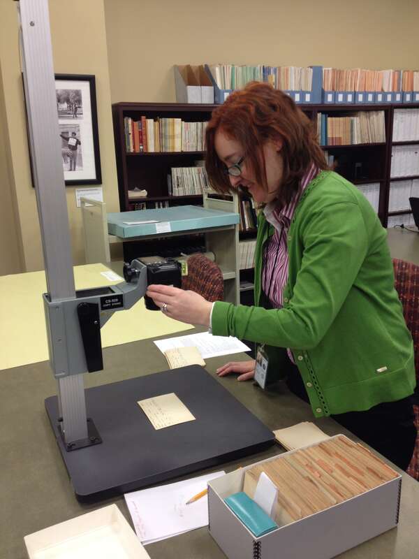Camera Stand digitization project - Aubrey Maynard (intern); Location: National Archives at Kansas City - RMKC Research Room, Kansas City, MO; Photographer: Elizabeth Burnes