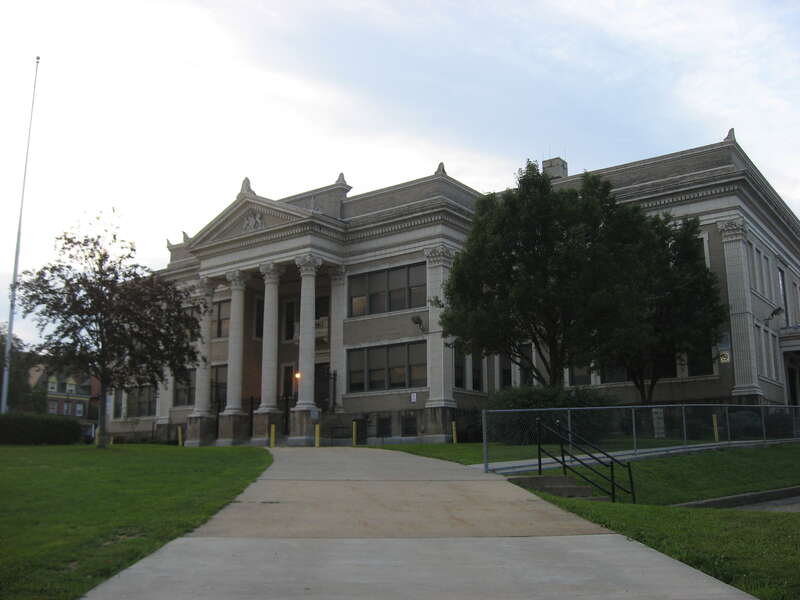View of the Liberty School No. 4, Friendship Building, a former elementary school (now a Montessori school) at 5501 Friendship Avenue in the Friendship neighborhood of Pittsburgh, Pennsylvania, United States.  Built in 1899, the Beaux-Arts school is