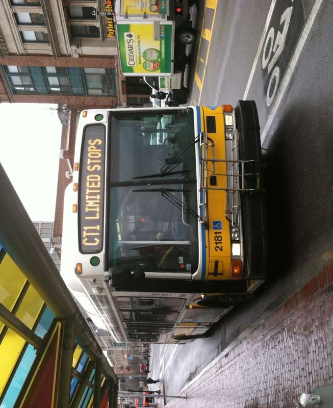 A southbound route CT1 bus at Central Square in April 2015