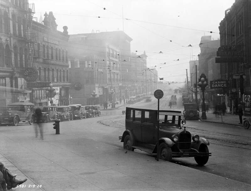 Looking south on Seattle's Second Avenue from just below Yesler Way, 1928. The next year, quite a few of the buildings on the left were knocked down, as the portion of Second Avenue in the foreground was continued linearly south-by-southeast to form