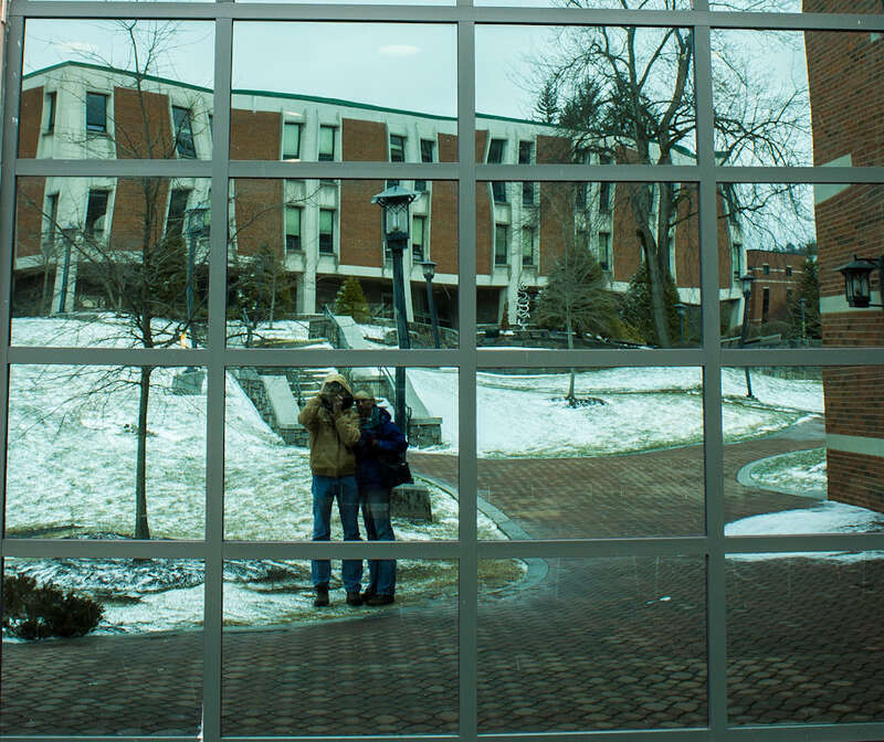 
500px provided description: My wife &amp; I.  This is me trying to be artistic. :D [#reflection ,#window ,#abstract ,#snow ,#canon ,#wife ,#ice ,#rebel ,#self-portrait ,#eos ,#550d ,#t2i ,#askew ,#North Carolina ,#Boone ,#ASU ,#Kathryn ,#App State]