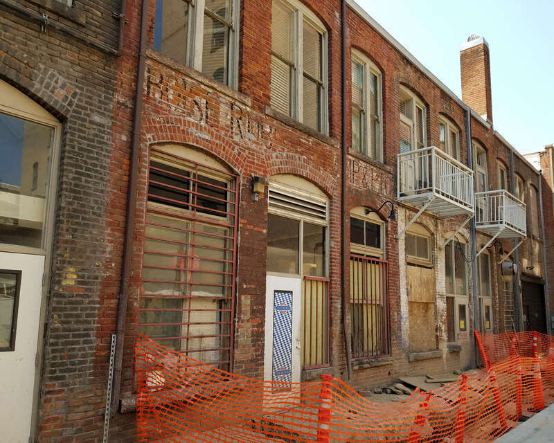 A ghost sign that may read, Boise Rubber Stamp &amp; Etc. is visible in Union Block Alley, Boise, Idaho.