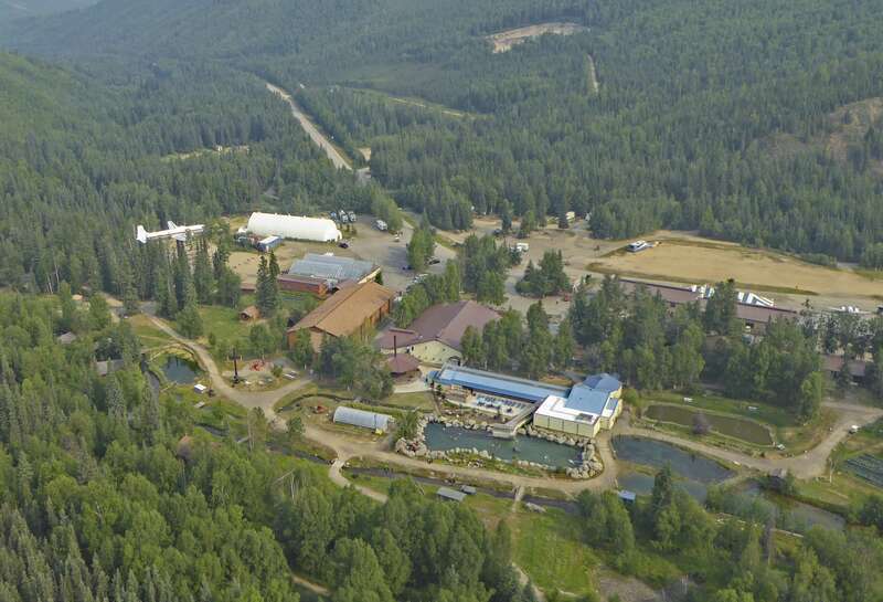 View from a Robinson R22 of Chena Hot Springs with the springs in the foreground, DC6 on the left and the campground in the distance