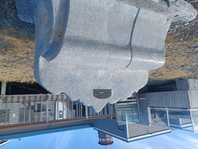 Memorial to Jean Keene, the "eagle lady" of Homer, Alaska, on the beach behind Land's End Resort