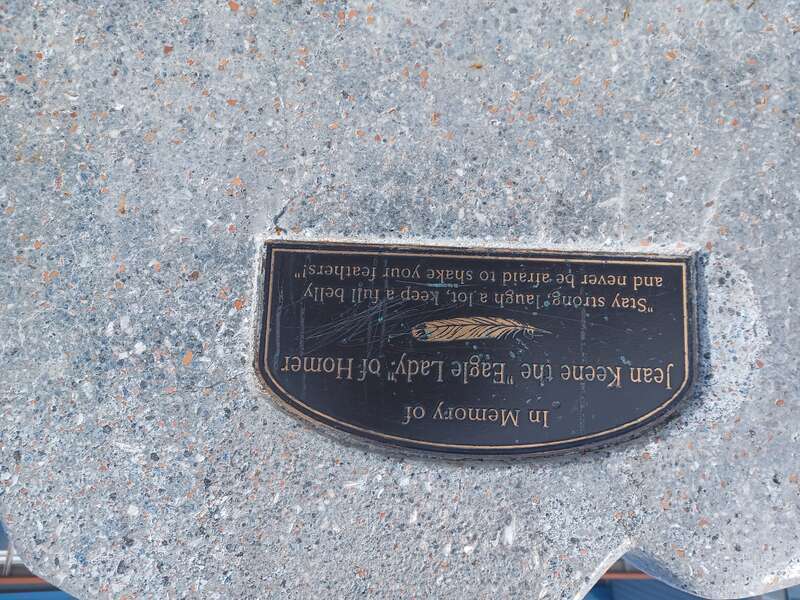 Plaque on memorial bench dedicated to Jean Keene, the "eagle lady" of Homer, Alaska