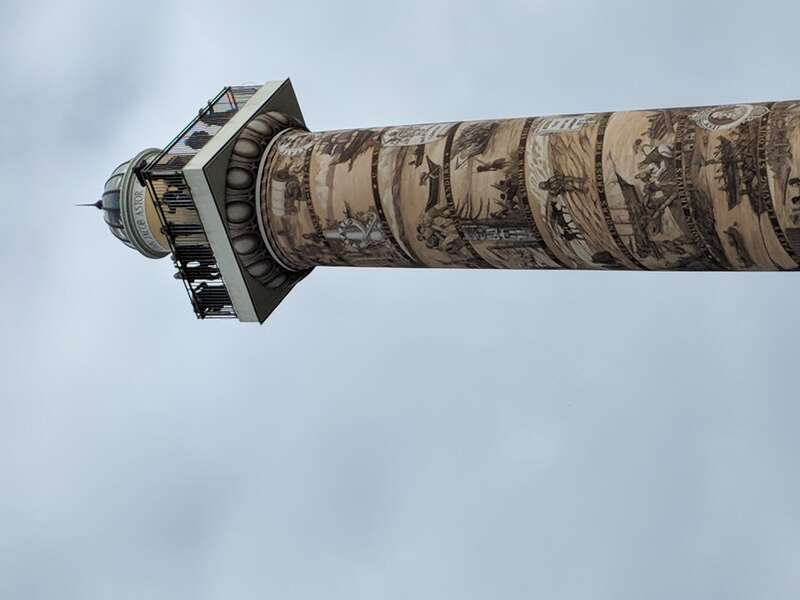164 steps up the inside of the column puts you onto the platform at the top