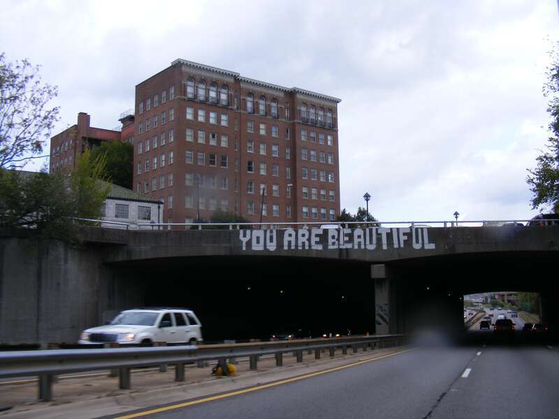 A couple of weeks ago a new piece of grafitti was found on the side of a bridge over one of the major highways in town. The message was something that needed to be shared though...

UPDATE: The sign was vandalized on December 23, 2010 with ALDOT