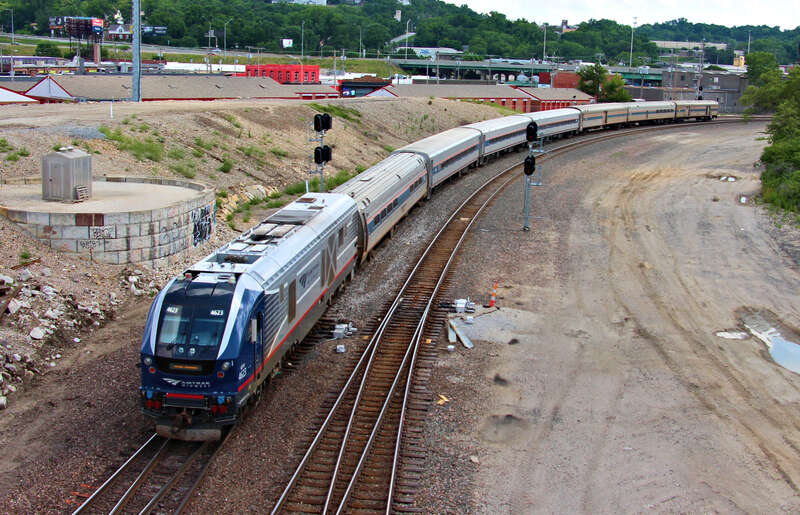 Amtrak "IDTX"4623(SC-44) is leading the Missouri River Runner into Santa Fe Junction to turn around to head back to Kansas City's Union Station seen from the 27th Street bridge to Nowhere west of Southwest Blvd in Kansas City, Missouri.
Photo Taken: