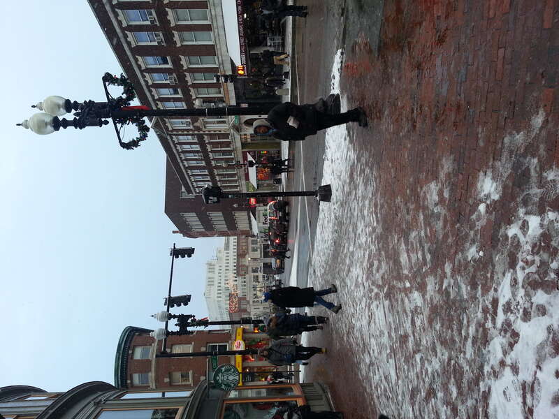 The intersection of Brattle Street and John F. Kennedy Street in Harvard Square, Cambridge, Massachusetts. Taken 2013-12.