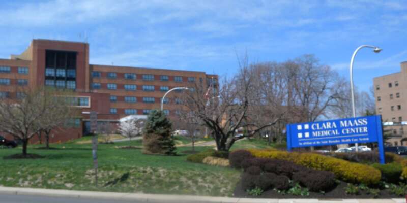 Looking west at the hospital entrance on a sunny midday.