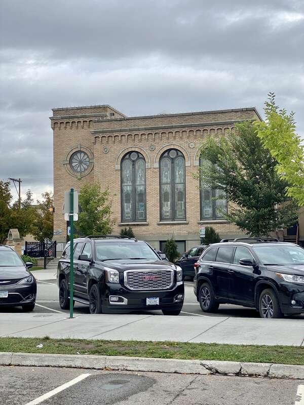 Built in 1921, this stripped and stark Romanesque Revival-style church, home to a Presbyterian congregation, stands at the corner of Central Avenue and 3rd Street in downtown Whitefish, Montana.
