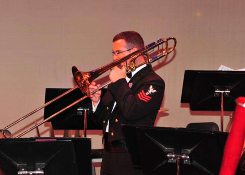 100321-N-2257C-003 SUMTER, S.C. (March 21, 2010) At the Patriot Hall Performing Arts Center in Sumter, S.C., US Navy Band member Musician 1st Class Colin Wise prepares for the trombone section's technical passage in Henry Fillmore's march, "Rolling