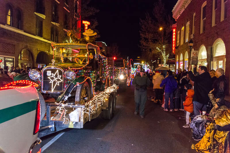 Smokey Bear joined Coconino National Forest employees and family members on our parade float at the Flagstaff Holiday of Lights, December 9, 2017. The crew decorated Engine 481 and the 1925 Dodge Brothers truck with holiday lights at the Flagstaff