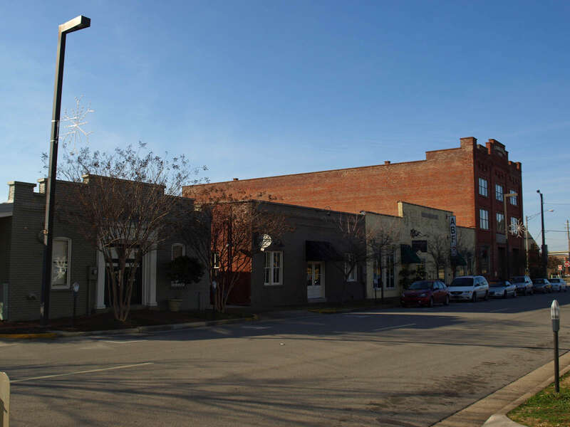 The 300 block of North Jefferson Street in Huntsville, Alabama. Each building is listed on the National Register of Historic Places. From left: en:Halsey Grocery Warehouse, en:305 Jefferson Street, en:Kelly Brothers and Rowe Building, en:Lombardo