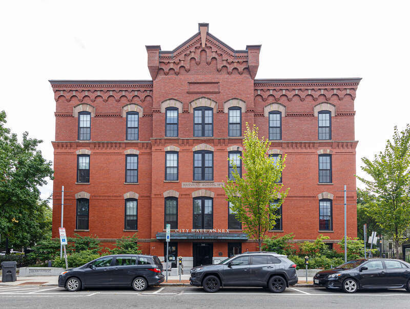 Cambridge City Hall Annex; formerly Harvard Grammar School 1871. Also says "McCusker Building". 344 Broadway, Cambridge, Massachusetts