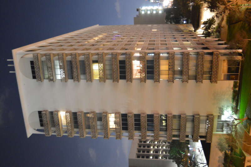 Northern end and western side of the Cambridge Tower, located at 1801 Lavaca Street in central Austin, Texas, United States.  Photo is taken from a balcony on the highest level of the AT&amp;T Executive Education and Conference Center, across MLK to
