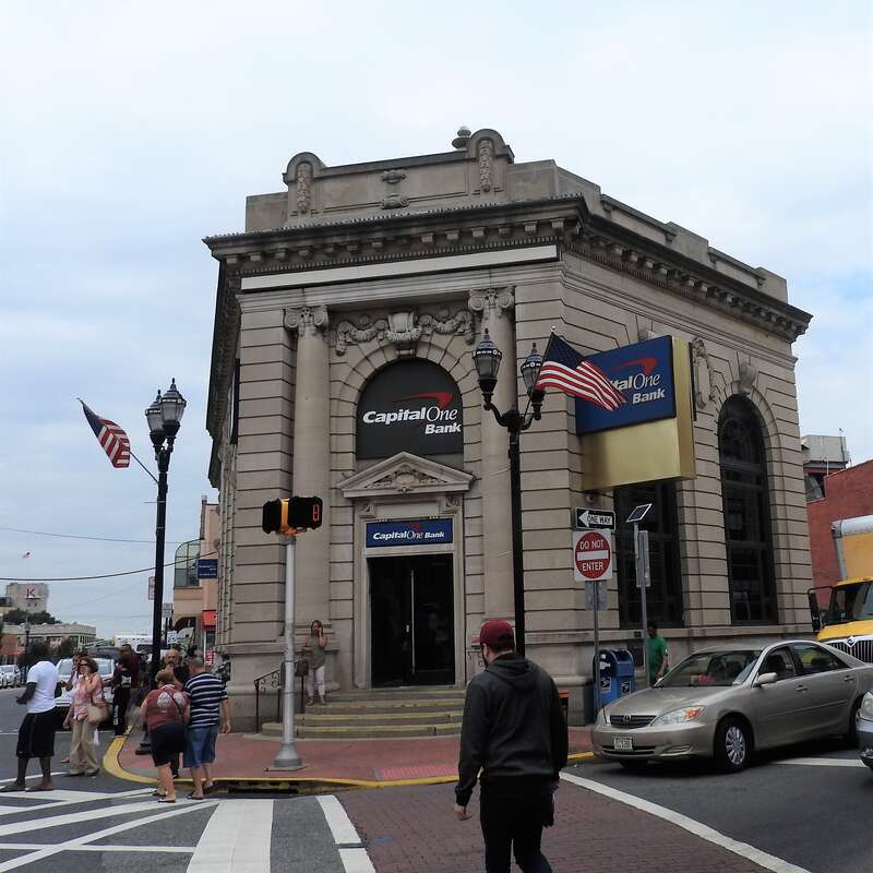 Looking north across Bergenline Avenue at bank on a cloudy day.