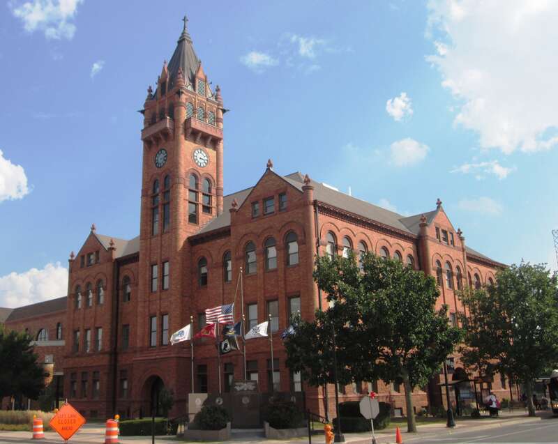 The Champaign County Courthouse, located at 101 East Main Street in Urbana, Illinois, is the fifth such building.  Built in 1900 for $150,000 and designed by Joseph Royer in the Richardsonian Romanesque style, the building has a 2002 addition to the