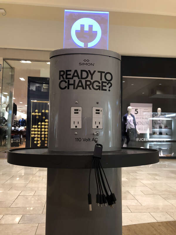 Cell phone charging station, Chestnut Hill Mall, Massachusetts