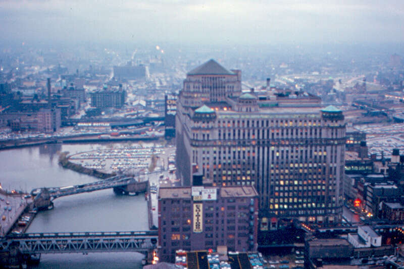 The Merchandise Mart was opened in 1930, after three years of construction.  It was the largest building in the world when it was opened.  It has 15 floors (20 in the tower).  Floor area is about 4 million sq.ft. (380,000 sq.m.).  About half of its