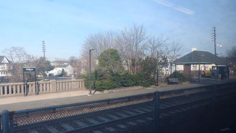 Looking west from a northbound train on a sunny morning.
