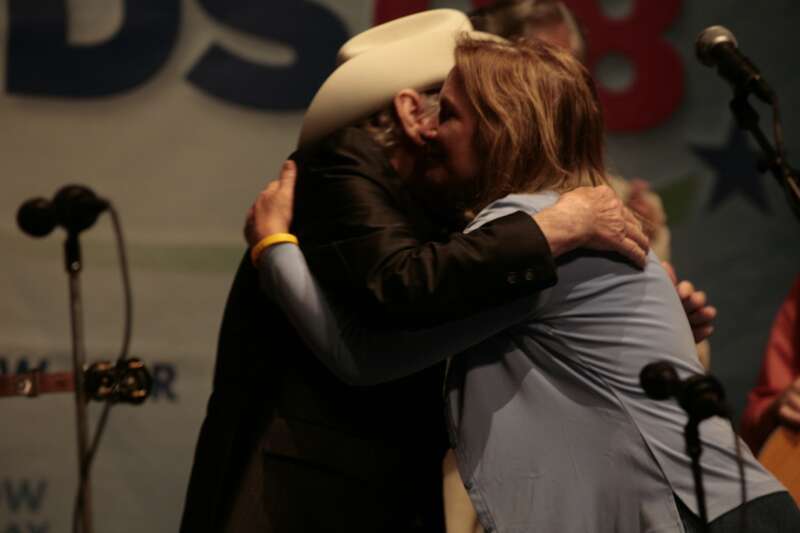 Elizabeth Edwards hugs Dr. Ralph Stanley during a concert with the Clinch Mountain Boys in Roanoke, Va.  Photo by Rachel Feierman.