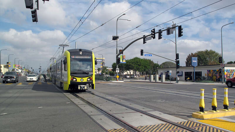 Southbound K Line train of LA Metro approaching Hyde Park Station at Crenshaw/Slauson, Los Angeles