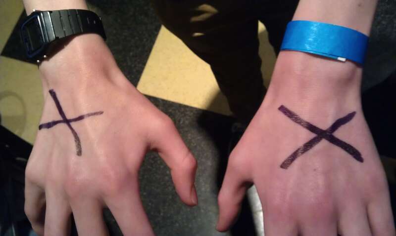 "Passout" crosses on hands at a Wikimania 2012 party