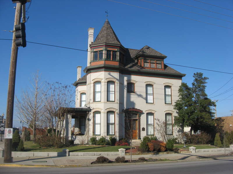 Front and western side of the D.D. Bogard House, located at 303 E. Fourth Street (Kentucky Route 2262) in Owensboro, Kentucky, United States.  Built in 1896, it is listed on the National Register of Historic Places.