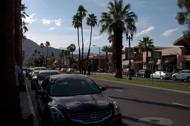 El Paseo, a block south of Hwy 111 in Palm Desert, is a very upscale shopping street.
I am looking west, and in the far distance, I can see snow-capped Mt. San Jacinto, which rises above Palm Springs.

Coachella Valley in Southern California's Low