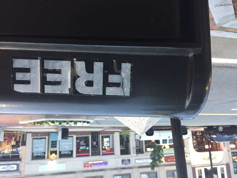 "FREE" posted on a magazine dispenser in Southern, New Hampshire