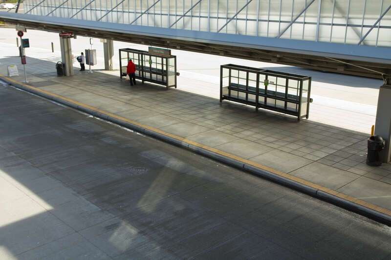 A next-departure board and a stand for an ORCA reader.  While the ORCA reader is definitely quite a distance from the head of the bay, there are two good reasons for this:
1) If we put the reader out in the open, it would get bumped, knocked and